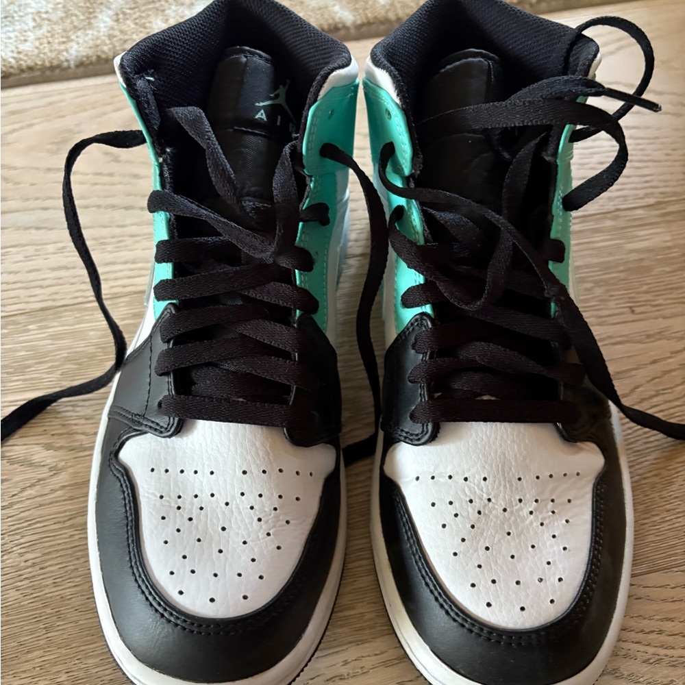 Black, White Air Jordan High-Top Sneakers with Teal Accents